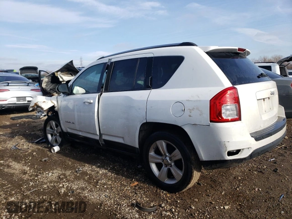 2011 Jeep Compass with VIN 1J4NT1FA9BD288917, listed as a Copart auction lot 85144894 with 0 mi miles and Salvage Title. Bid and sale history available at carsss.com. Image 2.