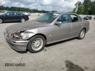 2001 BMW 5 Series 525iA with VIN WBADT43421GF57158, listed as a Copart auction lot 73212884 with 136,820 mi miles and Salvage Title. Bid and sale history available at carsss.com. Image 1.