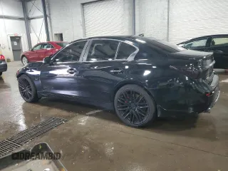 2014 Infiniti Q50 Premium with VIN JN1BV7AR1EM705764, listed as a Copart auction lot 50555595 with 105,626 mi miles and Salvage Title. Bid and sale history available at DreamBid. Image 2.
