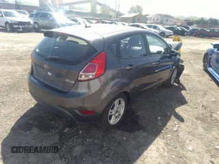 2018 Ford Fiesta SE with VIN 3FADP4EJ0JM141953, listed as a IAAI auction lot 38529613 with 74,502 mi miles and . Bid and sale history available at DreamBid. Image 4.