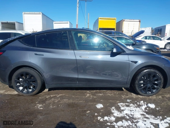 2023 Tesla Model Y Long Range with VIN 7SAYGAEE9PF905943, listed as a IAAI auction lot 41444255 with 11,179 mi miles. Bid and sale history available at carsss.com. Image 12.