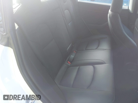 2023 Tesla Model 3 z VIN 5YJ3E1EA9PF576610, wystawiony jako IAAI lot #42206777 z przebiegiem 21 658 mil mil oraz . Historia ofert i sprzedaży dostępna na DreamBid. Obrazek 8.