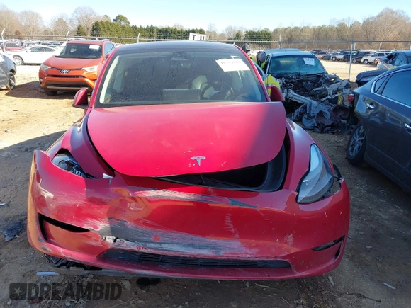 2023 Tesla Model Y Long Range with VIN 7SAYGDEE8PF709459, listed as a IAAI auction lot 41334108 with 51,544 mi miles. Bid and sale history available at carsss.com. Image 11.