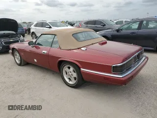 1995 Jaguar XJS with VIN SAJNX2742SC197388, listed as a Copart auction lot 76579714 with 99,077 mi miles and Salvage Title. Bid and sale history available at carsss.com. Image 2.