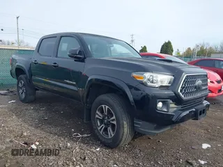 2018 Toyota Tacoma SR5 with VIN 3TMAZ5CN6JM055632, listed as a IAAI auction lot 40751593 with 125,663 mi miles and . Bid and sale history available at DreamBid. Image 1.