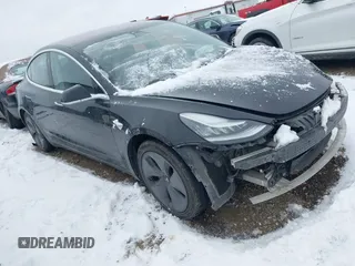 2018 Tesla Model 3 Long Range Battery with VIN 5YJ3E1EA2JF071855, listed as a IAAI auction lot 41314974 with 169,318 mi miles and . Bid and sale history available at DreamBid. Image 1.