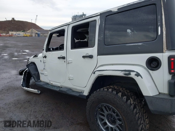 2015 Jeep Wrangler Unlimited Sahara with VIN 1C4BJWEG5FL518191, listed as a IAAI auction lot 41914581 with 107,433 mi miles. Bid and sale history available at carsss.com. Image 18.