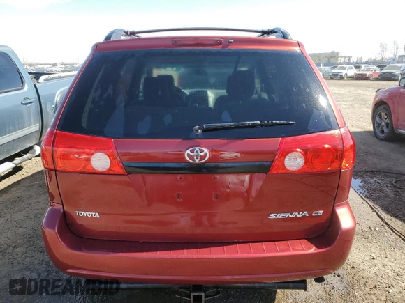 2010 Toyota Sienna with VIN 5TDZK4CC2AS303424, listed as a Copart auction lot 52880635 with 247,596 mi miles and Salvage Title. Bid and sale history available at DreamBid. Image 6.