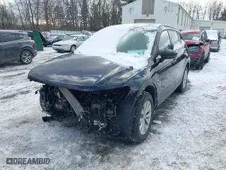 2019 Volkswagen Tiguan S with VIN 3VV0B7AX9KM047642, listed as a IAAI auction lot 41523269 with 61,221 mi miles. Bid and sale history available at carsss.com. Image 6.