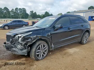 2019 Cadillac XT4 FWD Sport with VIN 1GYFZER45KF193517, listed as a Copart auction lot 61789415 with 106,846 mi miles and Salvage title. Bid and sale history available at DreamBid. Image 1.