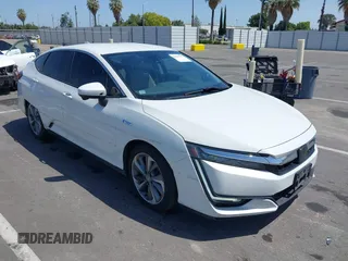2018 Honda Clarity z VIN JHMZC5F10JC015706, wystawiony jako IAAI lot #42290573 z przebiegiem 158 987 mil mil oraz . Historia ofert i sprzedaży dostępna na DreamBid. Obrazek 1.