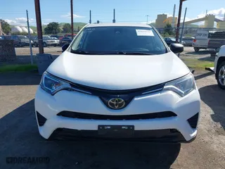2018 Toyota RAV4 LE with VIN 2T3ZFREV8JW467744, listed as a IAAI auction lot 41818614 with 95,609 mi miles. Bid and sale history available at carsss.com. Image 13.