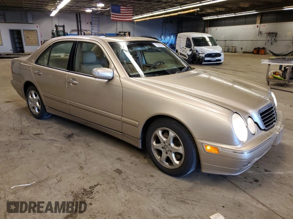 2002 Mercedes-Benz E-Class with VIN WDBJF65J12B485293, listed as a Copart auction lot 77561984 with 140,708 mi miles and Salvage Title. Bid and sale history available at carsss.com. Image 4.