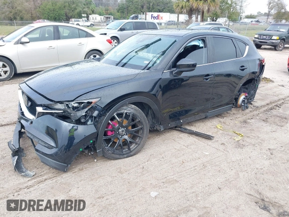 2019 Mazda CX-5 Touring with VIN JM3KFACM0K0692007, listed as a IAAI auction lot 41645657 with 1 mi miles. Bid and sale history available at carsss.com. Image 2.