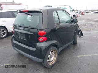 2012 Smart fortwo Pure z VIN WMEEJ3BA9CK521416, wystawiony jako IAAI lot #41847989 z przebiegiem Nie podano mil oraz . Historia ofert i sprzedaży dostępna na DreamBid. Obrazek 4.