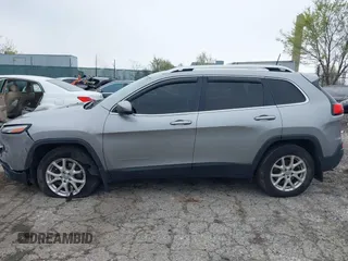 2016 Jeep Cherokee Latitude with VIN 1C4PJMCB4GW183037, listed as a IAAI auction lot 42003716 with 138,843 mi miles and . Bid and sale history available at DreamBid. Image 13.