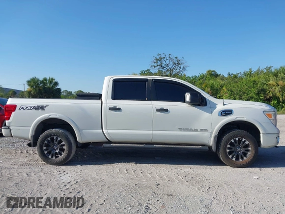 2016 Nissan Titan Platinum Reserve with VIN 1N6BA1F4XGN517905, listed as a IAAI auction lot 42676671 with 110,004 mi miles and . Bid and sale history available at DreamBid. Image 13.