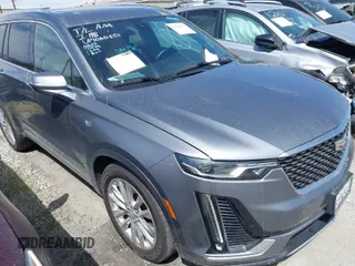 2020 Cadillac XT6 FWD Premium Luxury with VIN 1GYKPCRSXLZ105231, listed as a IAAI auction lot 41735556 with 70,319 mi miles. Bid and sale history available at carsss.com. Image 1.