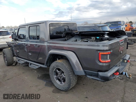 2021 Jeep Gladiator Rubicon with VIN 1C6JJTBG4ML504141, listed as a Copart auction lot 43367565 with 56,879 mi miles and Salvage title. Bid and sale history available at DreamBid. Image 2.
