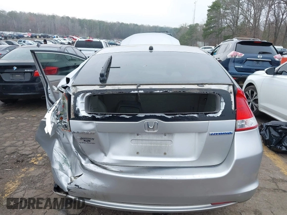 2010 Honda Insight EX with VIN JHMZE2H77AS022538, listed as a IAAI auction lot 41804579 with 184,000 mi miles and . Bid and sale history available at DreamBid. Image 15.