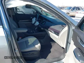 2023 Cadillac XT4 AWD Luxury with VIN 1GYFZBR40PF148068, listed as a IAAI auction lot 41583045 with 35,229 mi miles. Bid and sale history available at carsss.com. Image 5.