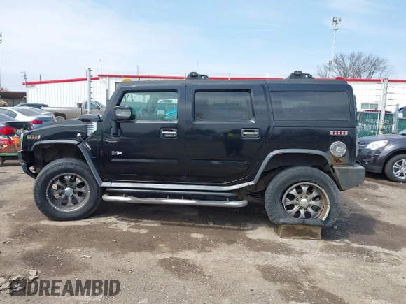 2007 Hummer H2 SUV z VIN 5GRGN23UX7H112972, wystawiony jako IAAI lot #41980625 z przebiegiem 214 857 mil mil oraz . Historia ofert i sprzedaży dostępna na DreamBid. Obrazek 15.