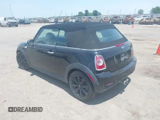 2013 MINI Convertible S with VIN WMWZP3C59DT550746, listed as a IAAI auction lot 39538986 with 59,934 mi miles and . Bid and sale history available at DreamBid. Image 3.