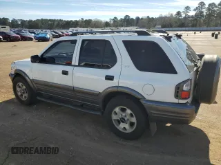 2001 Isuzu Rodeo S with VIN 4S2DM58W114343183, listed as a Copart auction lot 88128465 with 85,926 mi miles and Salvage Title. Bid and sale history available at DreamBid. Image 2.