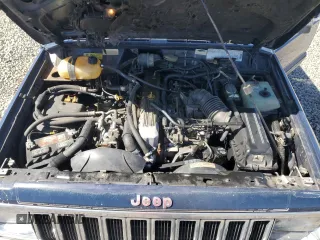 1987 Jeep Cherokee with VIN 1JCMT7842HT114597, listed as a Copart auction lot 49319945 with 230,675 mi miles and Clean title. Bid and sale history available at DreamBid. Image 11.