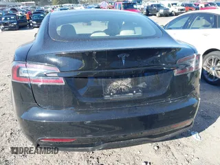 2021 Tesla Model S Long Range z VIN 5YJSA1E50MF438864, wystawiony jako IAAI lot #41190778 z przebiegiem Nie podano mil oraz . Historia ofert i sprzedaży dostępna na DreamBid. Obrazek 17.