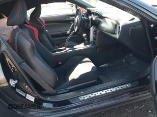 2014 Scion FR-S z VIN JF1ZNAA18E9700718, wystawiony jako IAAI lot #40958319 z przebiegiem 104 010 mil mil oraz . Historia ofert i sprzedaży dostępna na DreamBid. Obrazek 5.