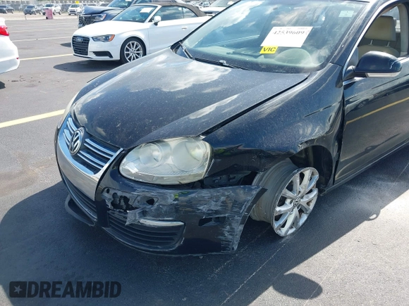 2010 Volkswagen Jetta Limited Edition z VIN 3VWRX7AJ4AM054934, wystawiony jako IAAI lot #42539609 z przebiegiem 245 048 mil mil oraz . Historia ofert i sprzedaży dostępna na DreamBid. Obrazek 6.