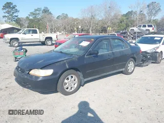 1998 Honda Accord LX z VIN 1HGCG5641WA215469, wystawiony jako IAAI lot #41801430 z przebiegiem 228 903 mil mil oraz . Historia ofert i sprzedaży dostępna na DreamBid. Obrazek 2.