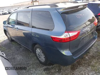 2016 Toyota Sienna XLE with VIN 5TDYK3DC8GS720852, listed as a IAAI auction lot 41341268 with 119,927 mi miles. Bid and sale history available at carsss.com. Image 3.