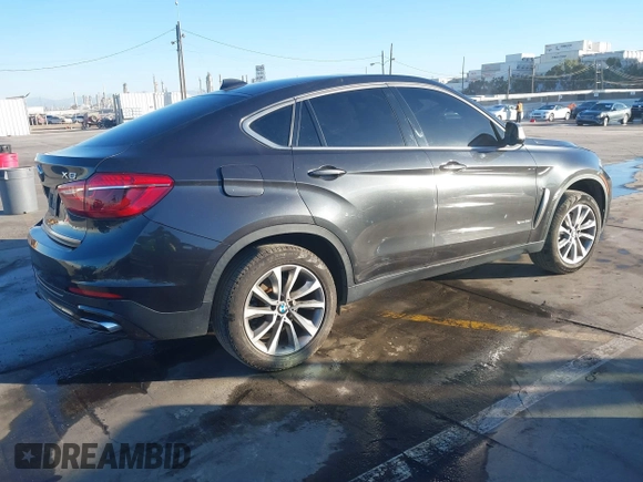 2019 BMW X6 sDrive35i z VIN 5UXKU0C57K0S97581, wystawiony jako IAAI lot #41322568 z przebiegiem 76 635 mil mil oraz . Historia ofert i sprzedaży dostępna na DreamBid. Obrazek 4.