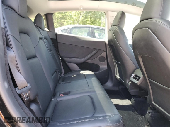 2024 Tesla Model Y z VIN 7SAYGDEDXRF991226, wystawiony jako Copart lot #62090255 z przebiegiem 42 853 mil mil oraz Szkoda całkowita • Salvage title. Historia ofert i sprzedaży dostępna na DreamBid. Obrazek 10.