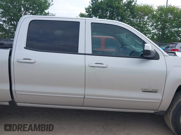 2018 Chevrolet Silverado 1500 LT with VIN 3GCPCREC8JG645232, listed as a IAAI auction lot 41927715 with 95,601 mi miles and . Bid and sale history available at DreamBid. Image 13.