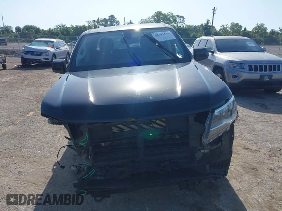 2018 Chevrolet Colorado 4WD LT z VIN 1GCGTCEN0J1265248, wystawiony jako IAAI lot #42247568 z przebiegiem 74 863 mil mil oraz . Historia ofert i sprzedaży dostępna na DreamBid. Obrazek 13.