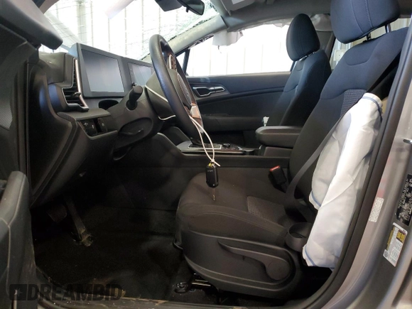 2024 Kia Sportage LX with VIN KNDPUCDF8R7276062, listed as a Copart auction lot 49069565 with 3,900 mi miles and Salvage Title. Bid and sale history available at DreamBid. Image 7.