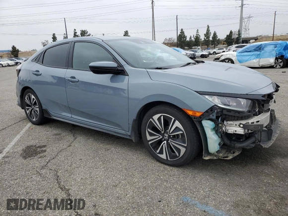 2021 Honda Civic Sport with VIN SHHFK7H4XMU422397, listed as a Copart auction lot 50767515 with 87,010 mi miles and Salvage Title. Bid and sale history available at DreamBid. Image 4.