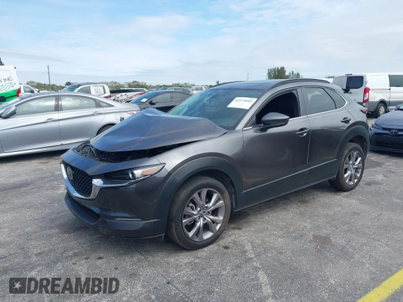 2021 Mazda CX-30 Preferred with VIN 3MVDMACLXMM228431, listed as a IAAI auction lot 41575602 with 67,854 mi miles. Bid and sale history available at carsss.com. Image 2.