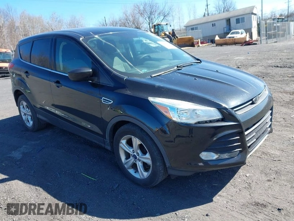 2015 Ford Escape SE with VIN 1FMCU9GX2FUB68101, listed as a IAAI auction lot 41902379 with 136,248 mi miles. Bid and sale history available at carsss.com. Image 1.