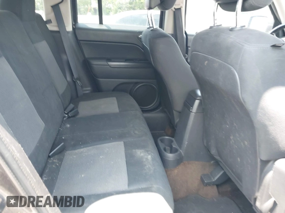 2014 Jeep Patriot High Altitude z VIN 1C4NJPFA9ED763968, wystawiony jako IAAI lot #42604911 z przebiegiem 134 519 mil mil oraz . Historia ofert i sprzedaży dostępna na DreamBid. Obrazek 8.