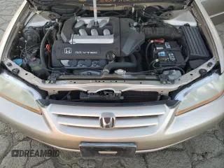 2001 Honda Accord LX z VIN 1HGCG16461A067174, wystawiony jako Copart lot #87543245 z przebiegiem 148 410 mil mil oraz Czysty tytuł • Clean title. Historia ofert i sprzedaży dostępna na DreamBid. Obrazek 11.