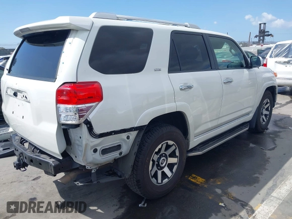 2013 Toyota 4Runner SR5 with VIN JTEZU5JR0D5058328, listed as a IAAI auction lot 41948095 with 195,332 mi miles and . Bid and sale history available at DreamBid. Image 4.