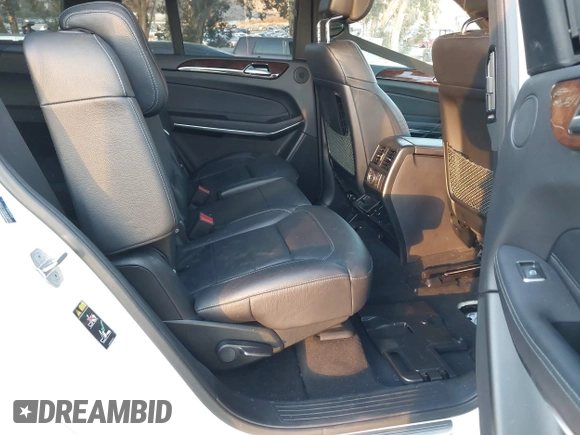 2018 Mercedes-Benz GLS 550 z VIN 4JGDF7DE2JB097282, wystawiony jako IAAI lot #41060046 z przebiegiem 71 317 mil mil oraz . Historia ofert i sprzedaży dostępna na DreamBid. Obrazek 8.