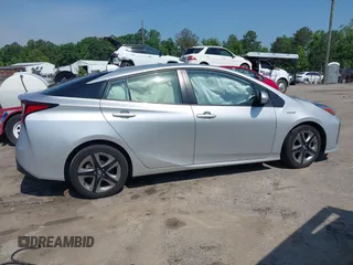 2021 Toyota Prius L Eco z VIN JTDKAMFU5M3137298, wystawiony jako IAAI lot #42270937 z przebiegiem 38 828 mil mil oraz . Historia ofert i sprzedaży dostępna na DreamBid. Obrazek 12.