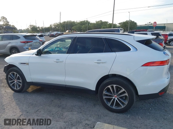 2020 Jaguar F-Pace 25t Premium z VIN SADCJ2FXXLA631058, wystawiony jako IAAI lot #42114146 z przebiegiem 56 763 mil mil oraz . Historia ofert i sprzedaży dostępna na DreamBid. Obrazek 14.