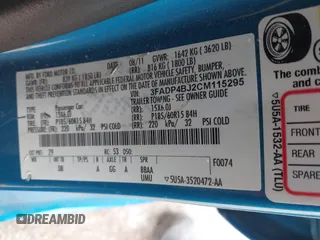 2012 Ford Fiesta SE with VIN 3FADP4BJ2CM115295, listed as a IAAI auction lot 41609949 with Not Provided miles. Bid and sale history available at carsss.com. Image 9.