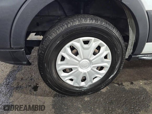 2015 Ford Transit Cargo with VIN 1FTNR1ZM9FKA60864, listed as a IAAI auction lot 42685568 with 154,262 mi miles and . Bid and sale history available at DreamBid. Image 13.